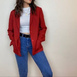 Red blazer. Sort of a burnt red blazer